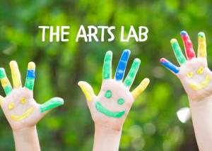 childrens hands covered in paint