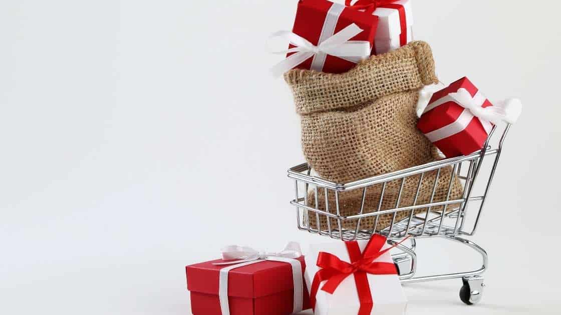 christmas shopping parcels in shopping basket