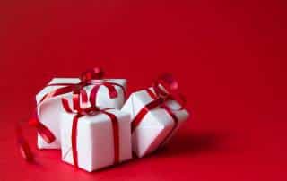 Christmas gift boxes with red ribbon