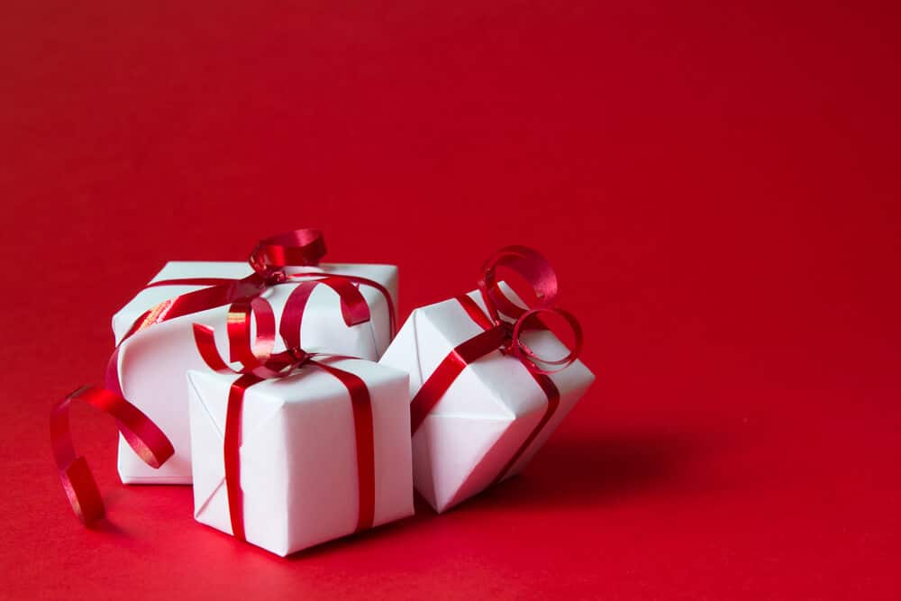 Christmas gift boxes with red ribbon