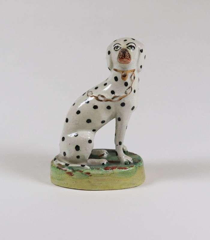 Staffordshire ware figurine of sitting dalmation - part of the decorative arts collection