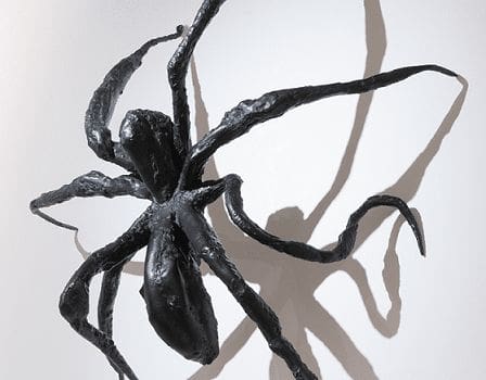 Sculpture of a spider mounted on a wall, part of Louise Bourgeois exhibition at the Burton art gallery