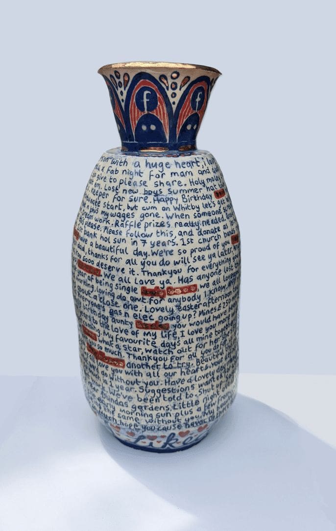 Stoneware vase inscribed with text from an open Facebook profile.