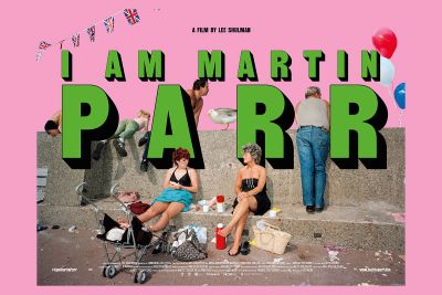 I Am Martin Parr promotional poster showing women sunbathing against a wall