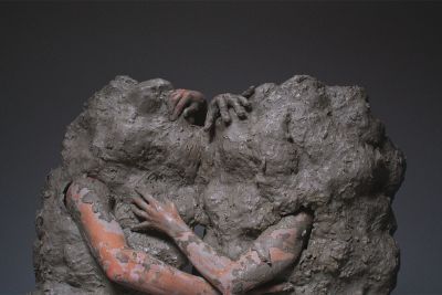Dumbmud William Cobbing Image shows two people covered in clay