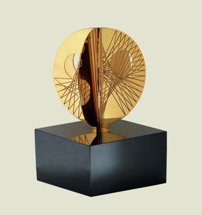 Image shows small golden sculpture on black plinth. Barbara Hepworth, Mincarlo, Three Curves with Strings, 1971. On long loan to Wakefield Council Permanent Art Collection (The Hepworth Wakefield)